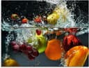 Artland Glasbild Spritzendes Obst auf dem Wasser | Mehrfarbig