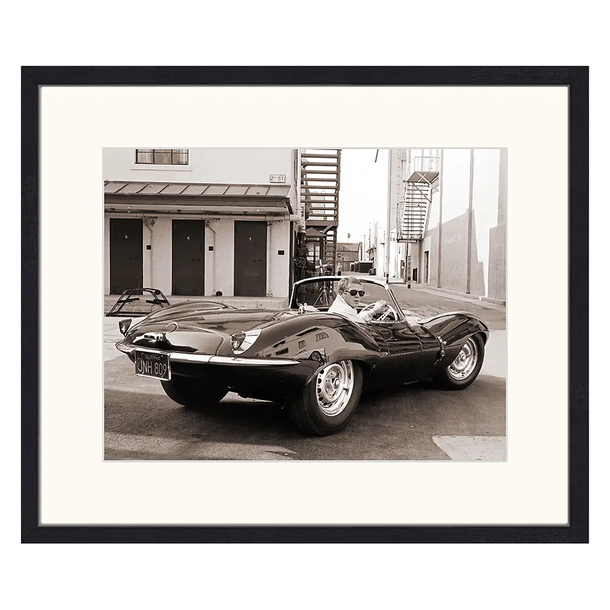 Bild Steve McQueen in his Jaguar | Mehrfarbig